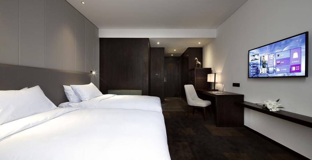 Ease House Luoyang Hotel Luoyang  Quarto foto